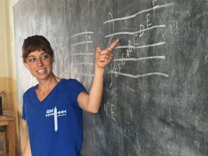 Alyssa Teaching with Whiteboard