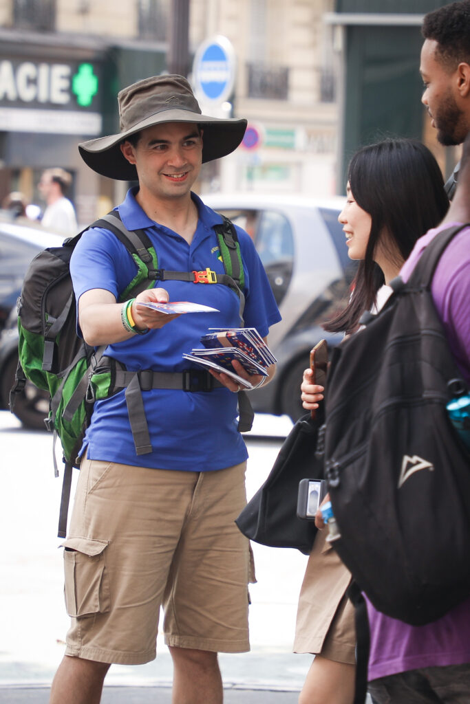 Joshua Handing Out Booklets